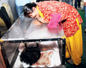 Hemchandra Pandeys wife Babita cries over his coffin in new delhi on wednesday. Picture by ramakant kushwaha